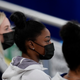 United States gymnast Simone Biles sits on the stands during the artistic gymnastics women’s all-around final at the 2020 Summer Olympics, Thursday, July 29, 2021, in Tokyo, Japan.